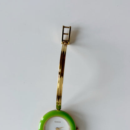 Gucci 1990s Interchangeable Bezel Gold Plated Bangle Watch with 12 bezels, case