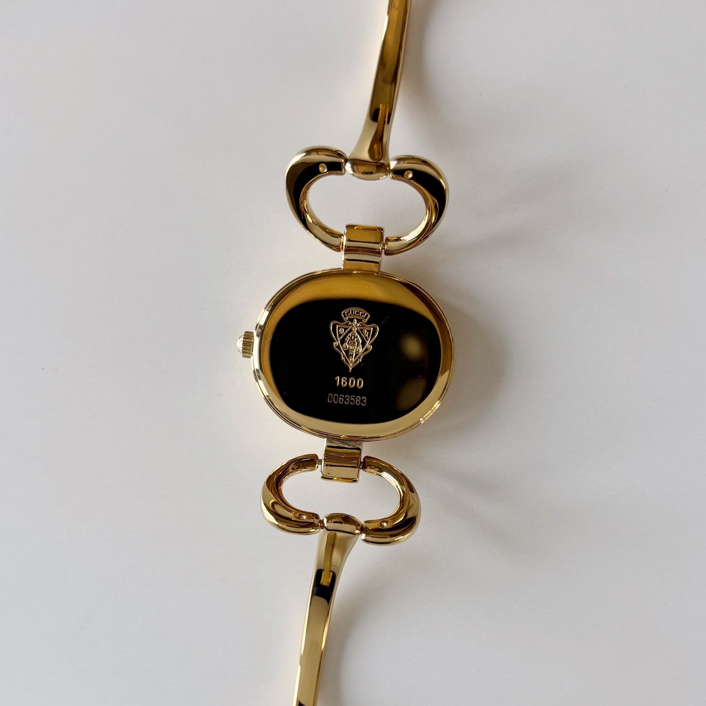Gucci 1990s Oval Dial Gold Plated Bangle Watch