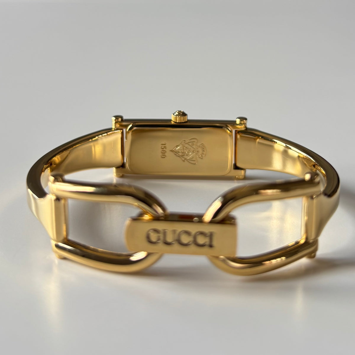 Gucci 1990s Rectangular Gold Dial Gold Plated Bangle Watch (Small)