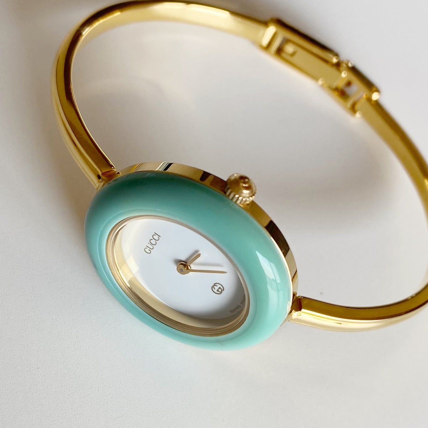 Gucci 1990s Interchangeable Bezel Gold Plated Bangle Watch with 12 bezels, case