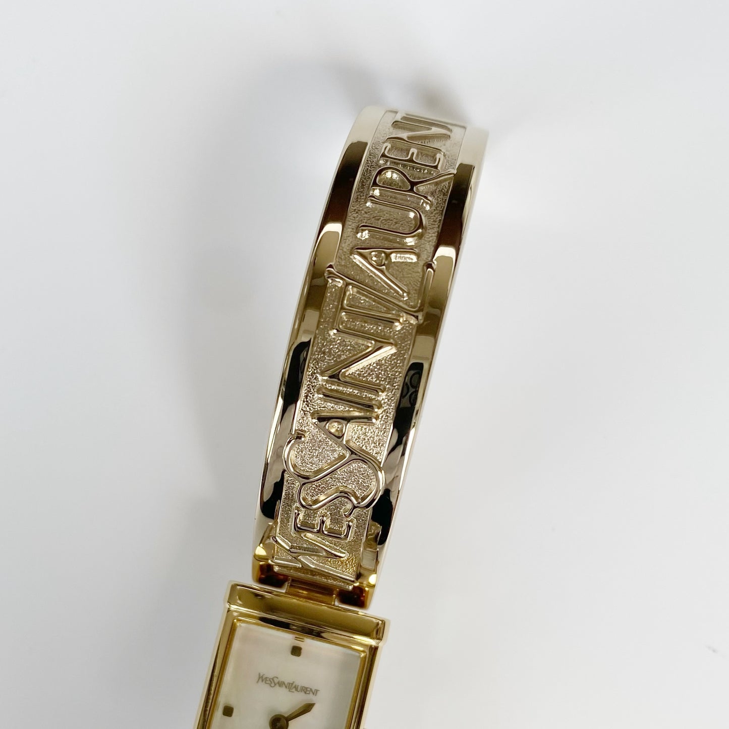 Yves Saint Laurent 1990s Seashell Dial Gold Plated Bangle Watch