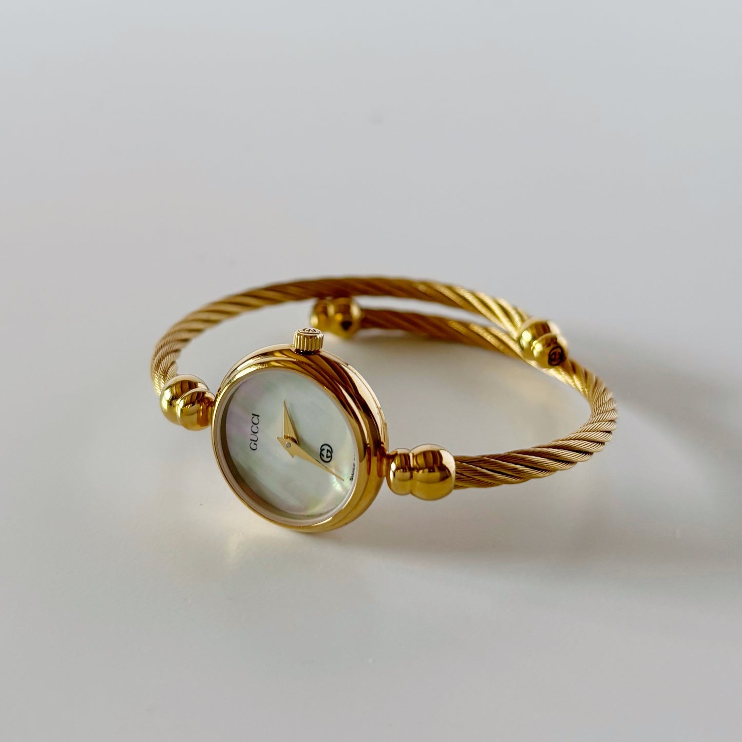 Gucci 1990s Seashell Dial Gold Plated Cable Bangle Watch