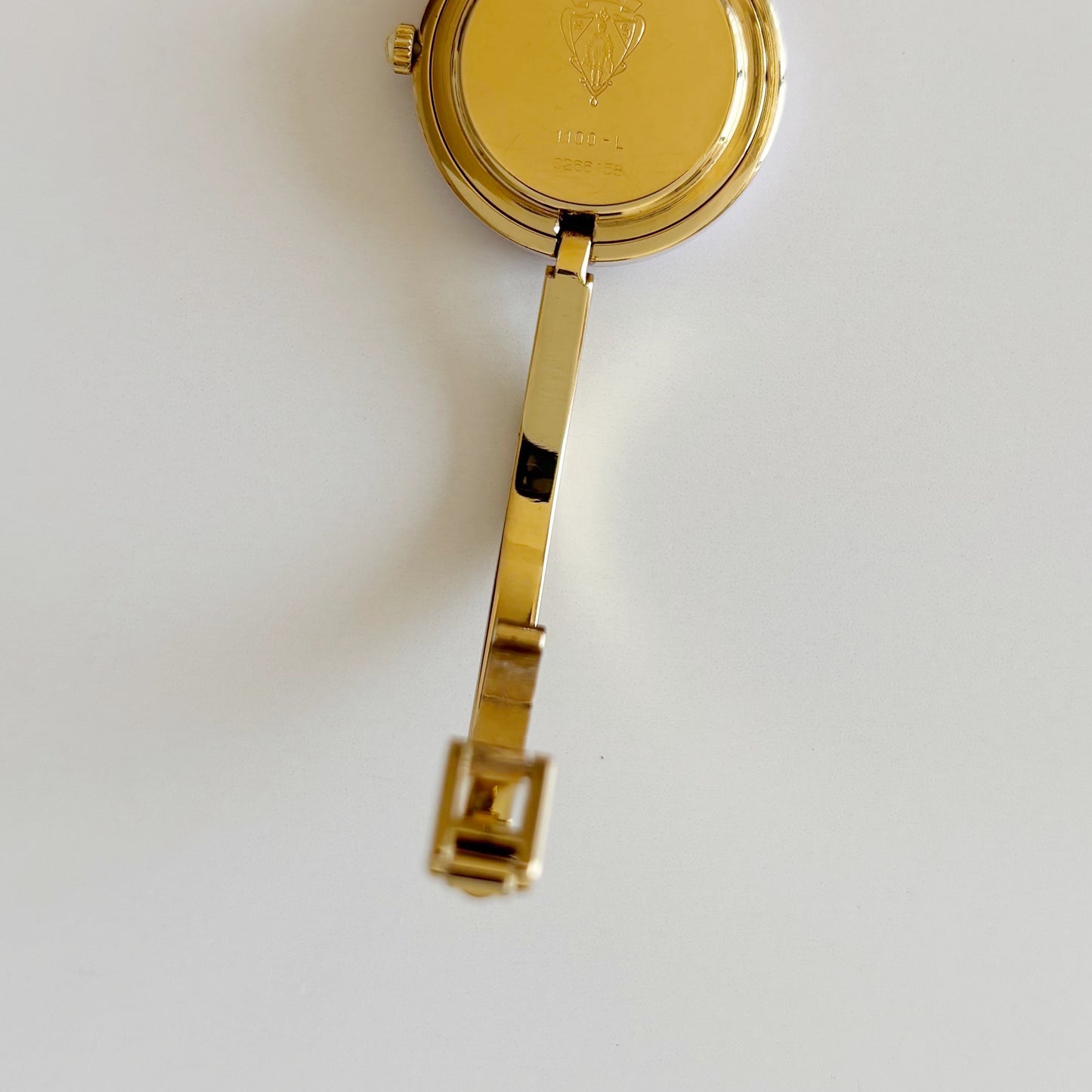 Gucci 1990s Interchangeable Bezel Gold Plated Bangle Watch with 12 bezels, case