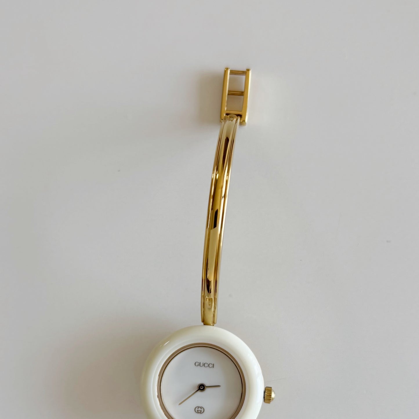 Gucci 1980s Interchangeable Bezel Gold Plated Bangle Watch with 12 bezels, case