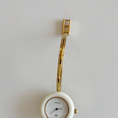 Gucci 1980s Interchangeable Bezel Gold Plated Bangle Watch with 12 bezels, case