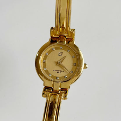 Givenchy 1990s Round Dial Gold Plated Bangle Watch