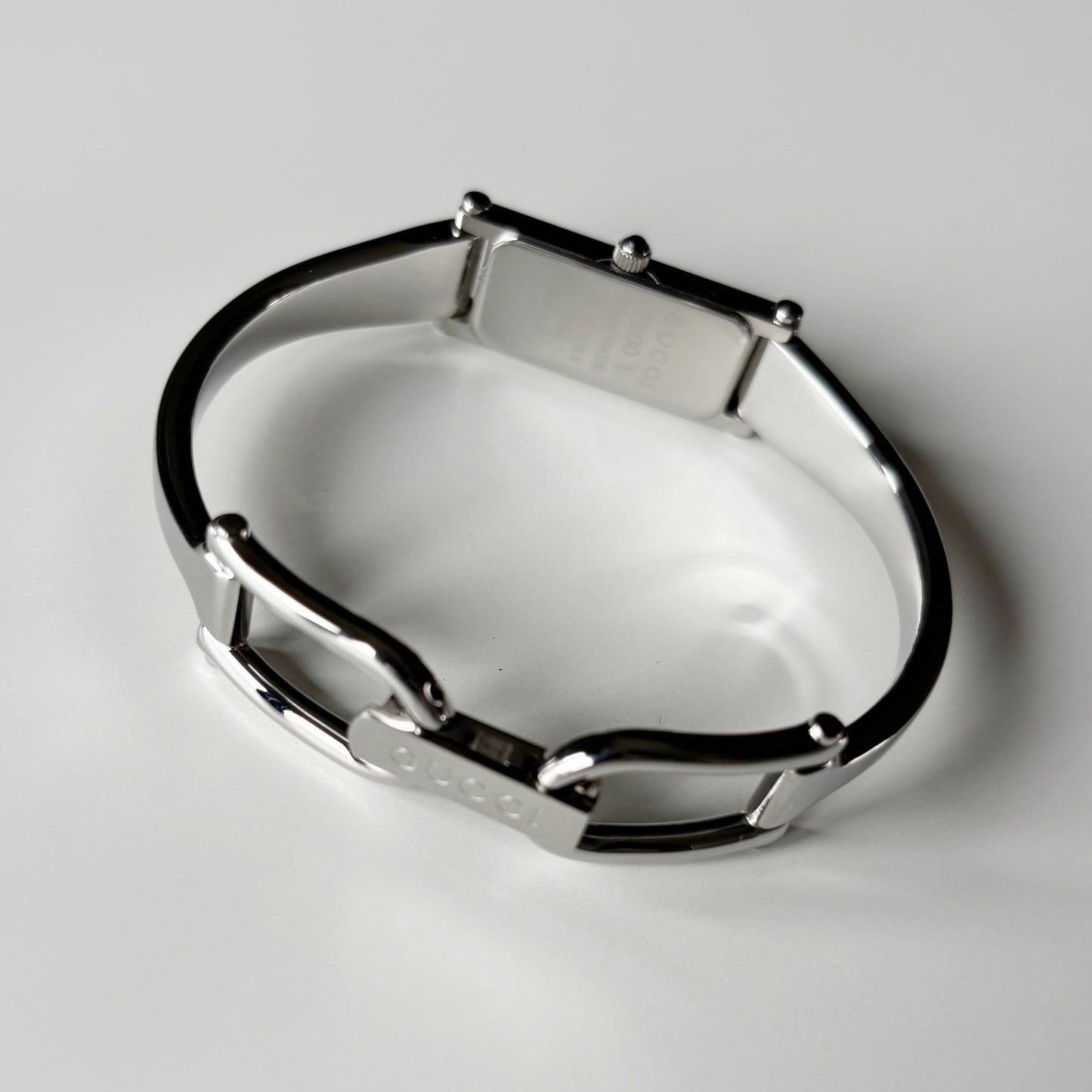 Gucci 1990s Rectangular Dial Silver Bangle Watch