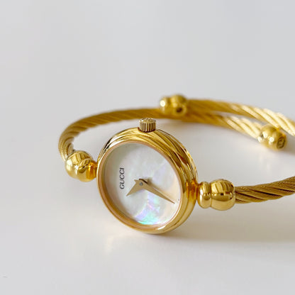 Gucci 1990s Seashell Dial Gold Plated Cable Bangle Watch