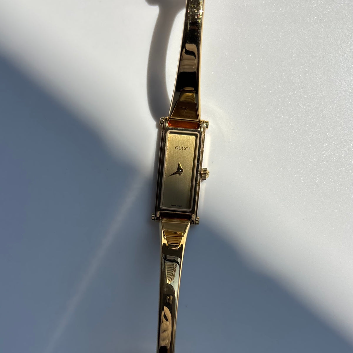 Gucci 1990s Gold Rectangular Dial Gold Plated Bangle Watch