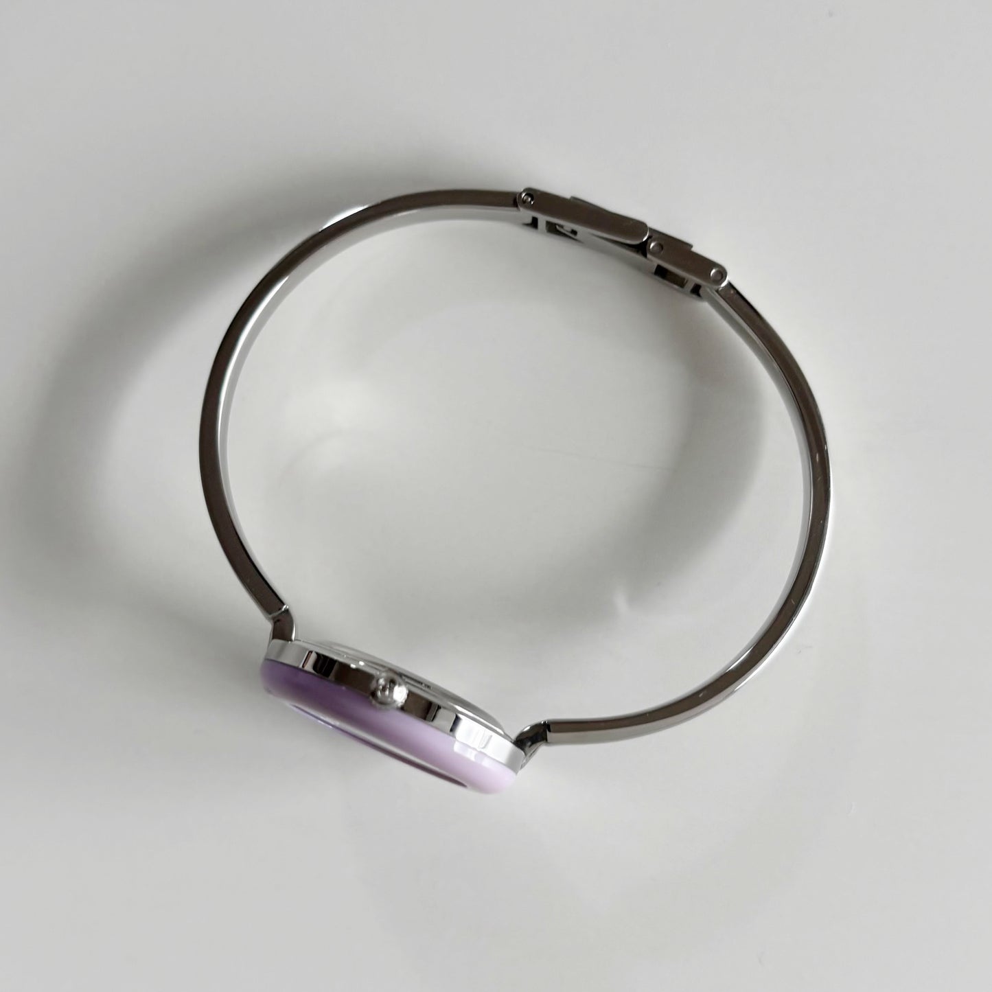 Gucci 1990s Interchangeable Bezel Stainless Steel Bangle Watch with 12 bezels, case