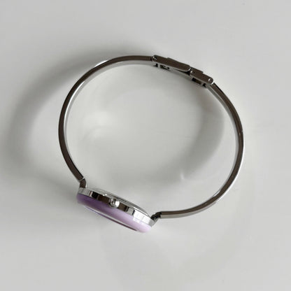 Gucci 1990s Interchangeable Bezel Stainless Steel Bangle Watch with 12 bezels, case