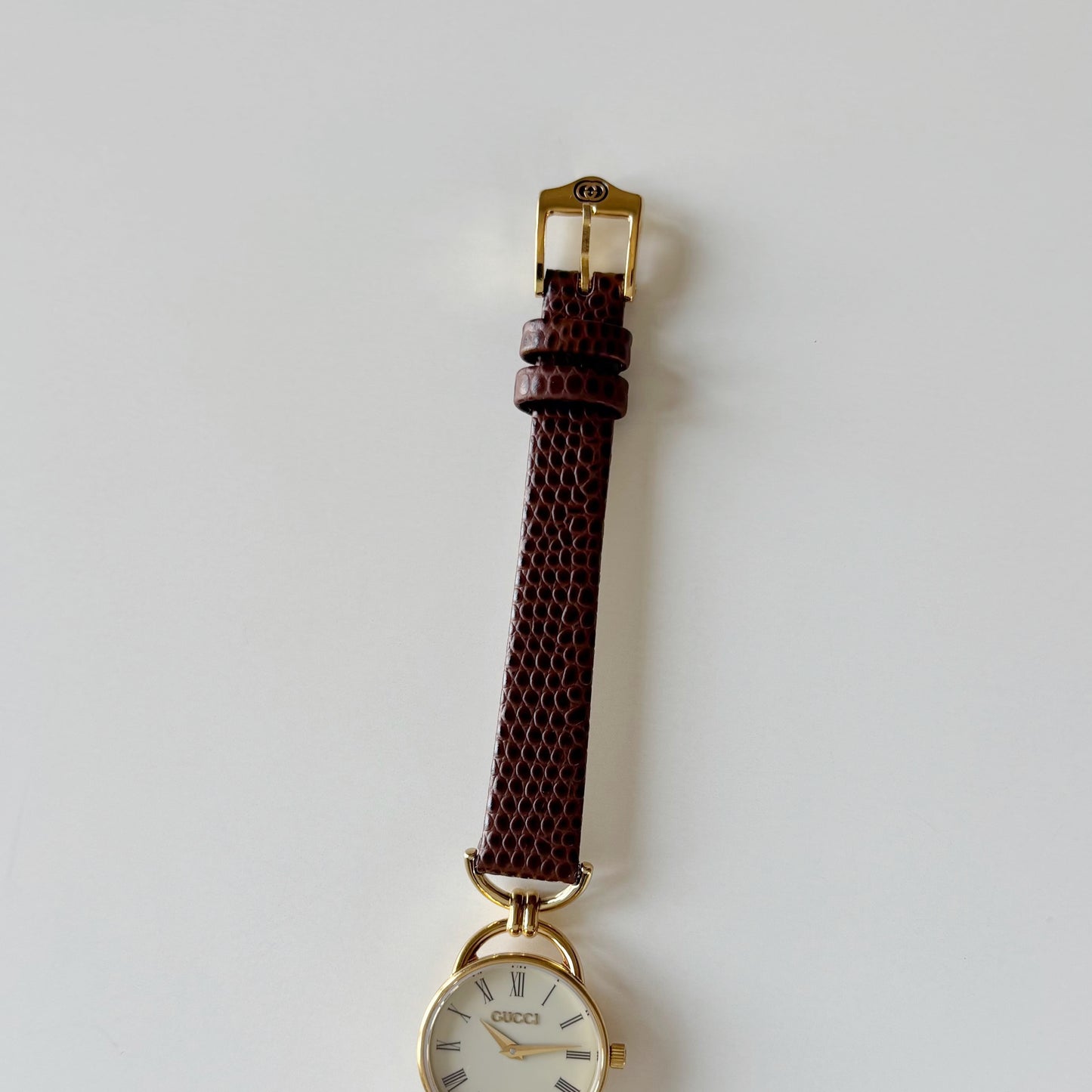 Gucci 1990s Round Cream Dial Horsebit Gold Plated Watch