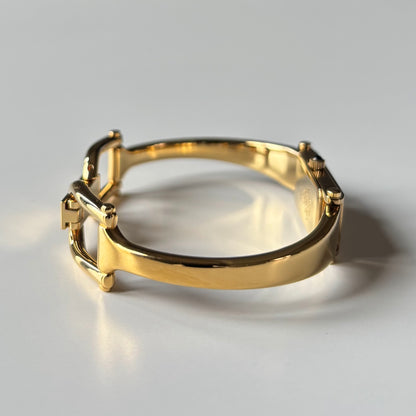 Gucci 1990s Gold Rectangular Dial Gold Plated Bangle Watch