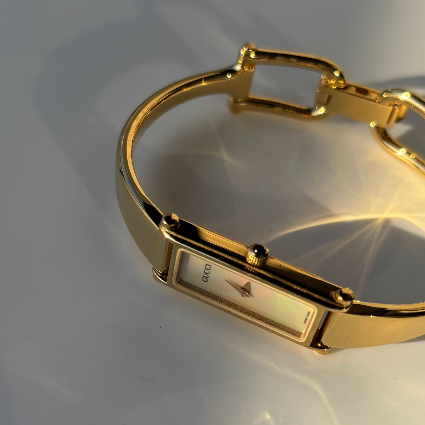 Gucci 1990s Seashell Dial Rectangular Gold Plated Bangle Watch