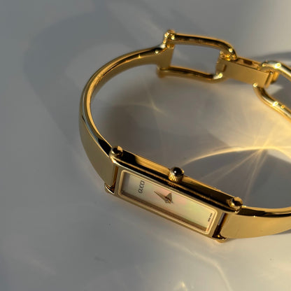 Gucci 1990s Seashell Dial Rectangular Gold Plated Bangle Watch
