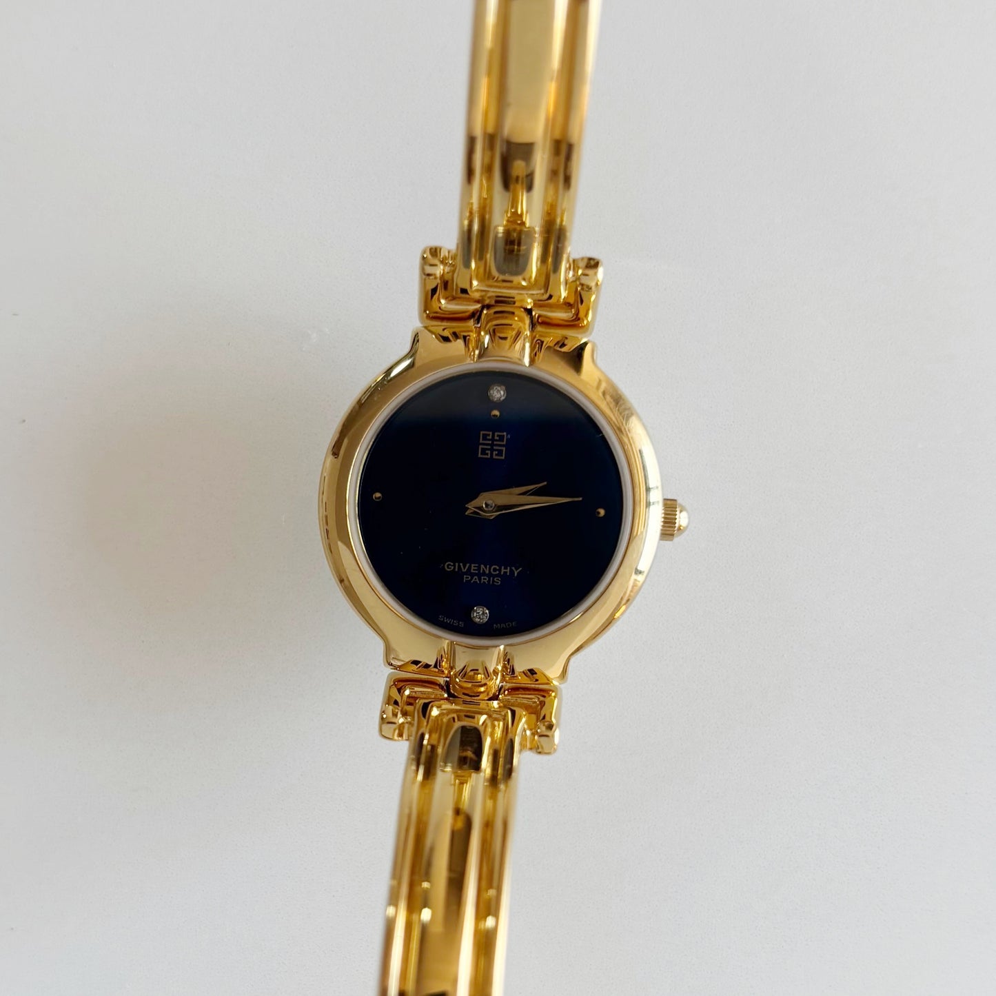 Givenchy 1990s Navy Round Dial Gold Plated Bangle Watch
