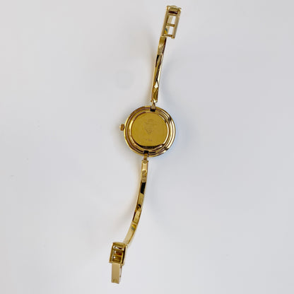 Gucci 1990s Interchangeable Bezel Gold Plated Bangle Watch with 12 bezels, case