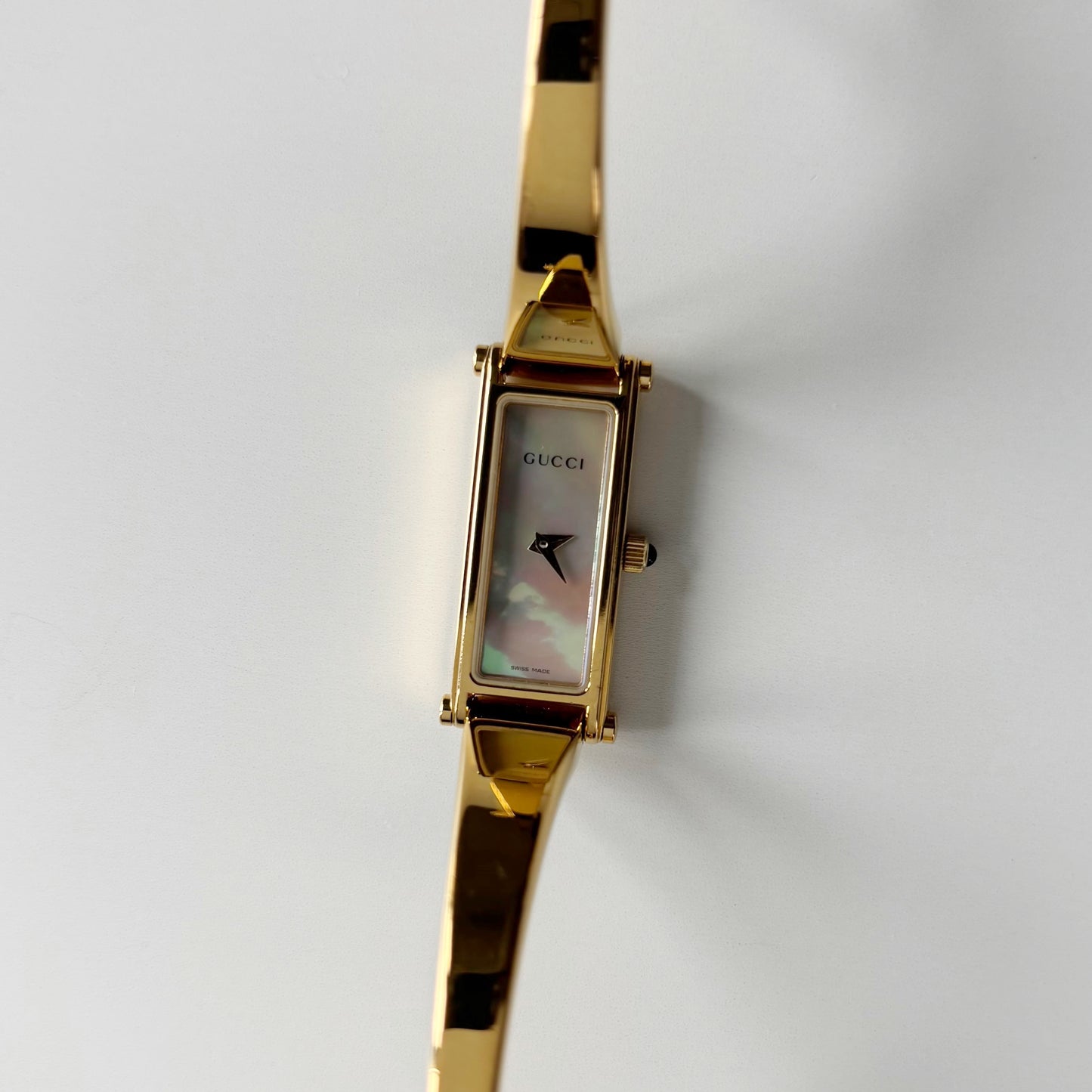 Gucci 1990s Seashell Rectangular Dial Gold Plated Bangle Watch