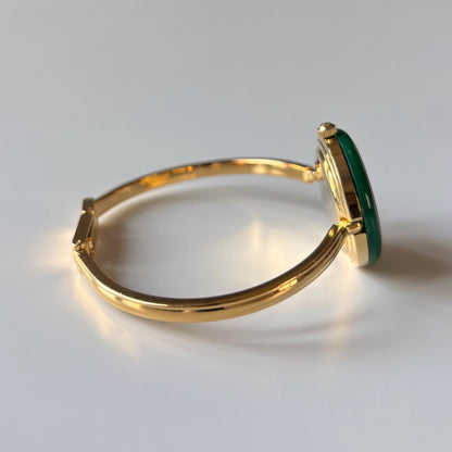 Gucci 1990s Interchangeable Bezel Gold Plated Bangle Watch with 12 bezels, case