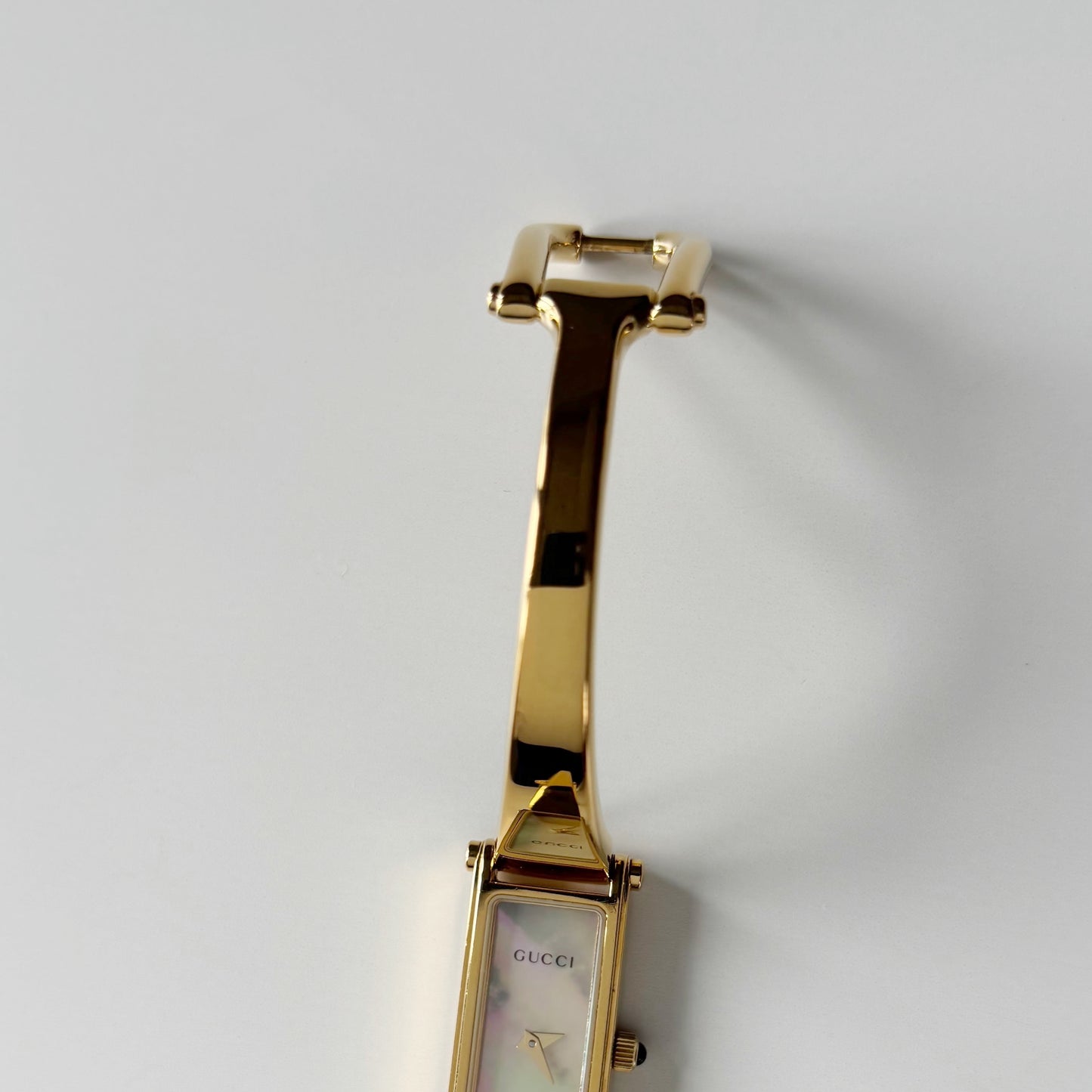 Gucci 1990s Seashell Rectangular Dial Gold Plated Bangle Watch