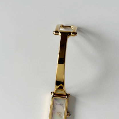 Gucci 1990s Seashell Rectangular Dial Gold Plated Bangle Watch