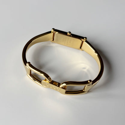 Gucci 1990s Gold Rectangular Dial Gold Plated Bangle Watch