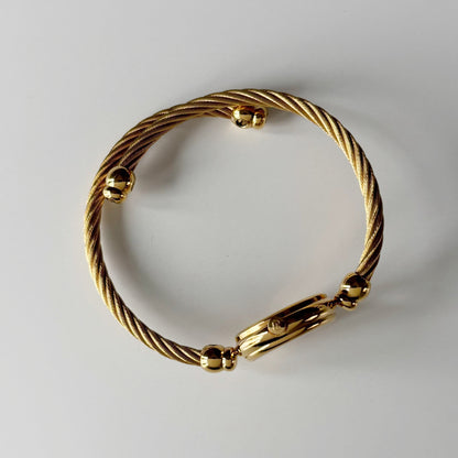 Gucci 1980s Round Dial Cable Band Bangle Watch
