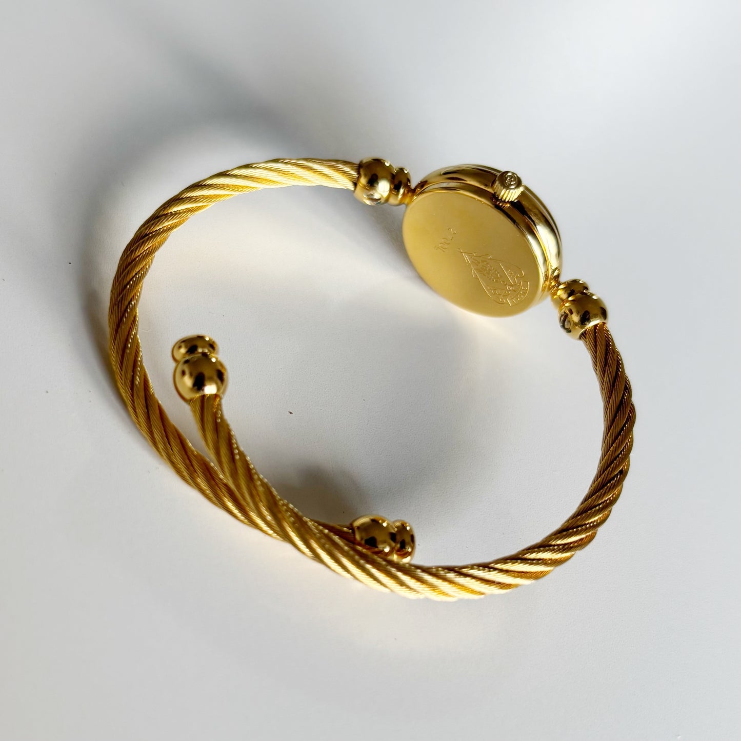 Gucci 1990s Seashell Dial Gold Plated Cable Band Bangle Watch