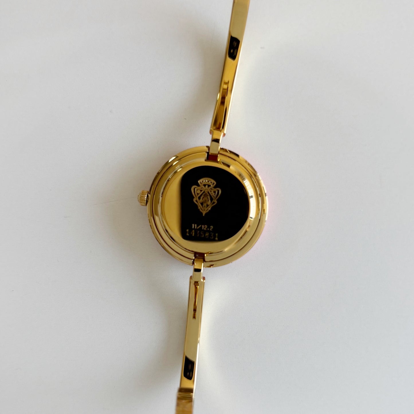 Gucci 1990s Interchangeable Bezel Gold Plated Bangle Watch with 12 bezels, case
