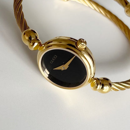 Gucci 1990s Black Dial Gold Plated Cable Bangle Watch