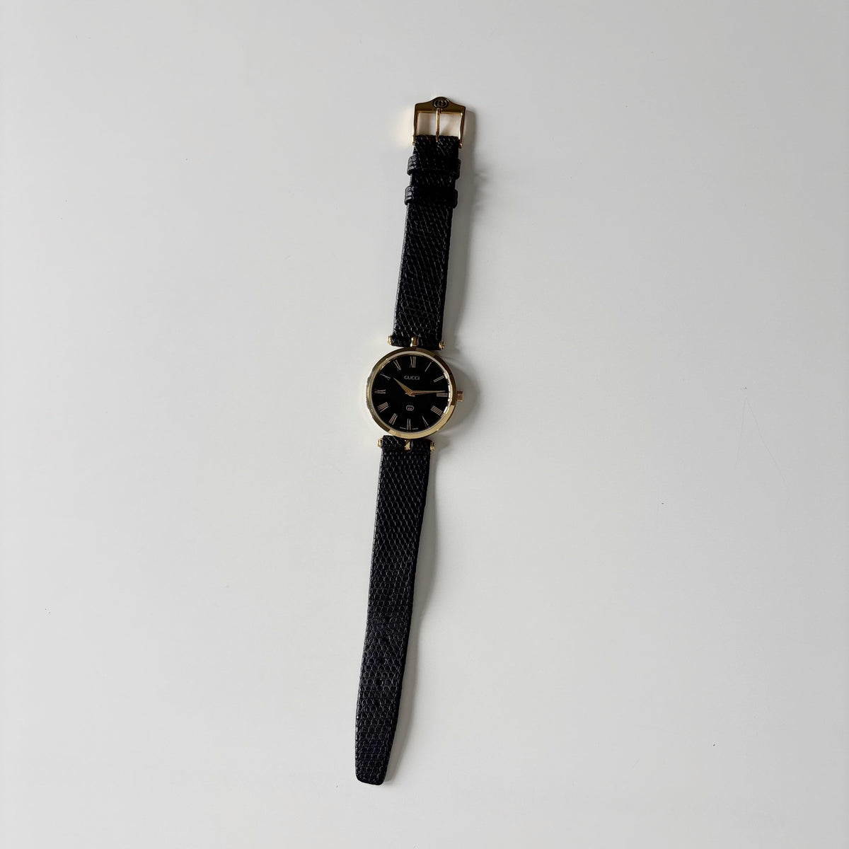 Gucci 1980s Round Black Dial Gold-Plated Watch (Large)