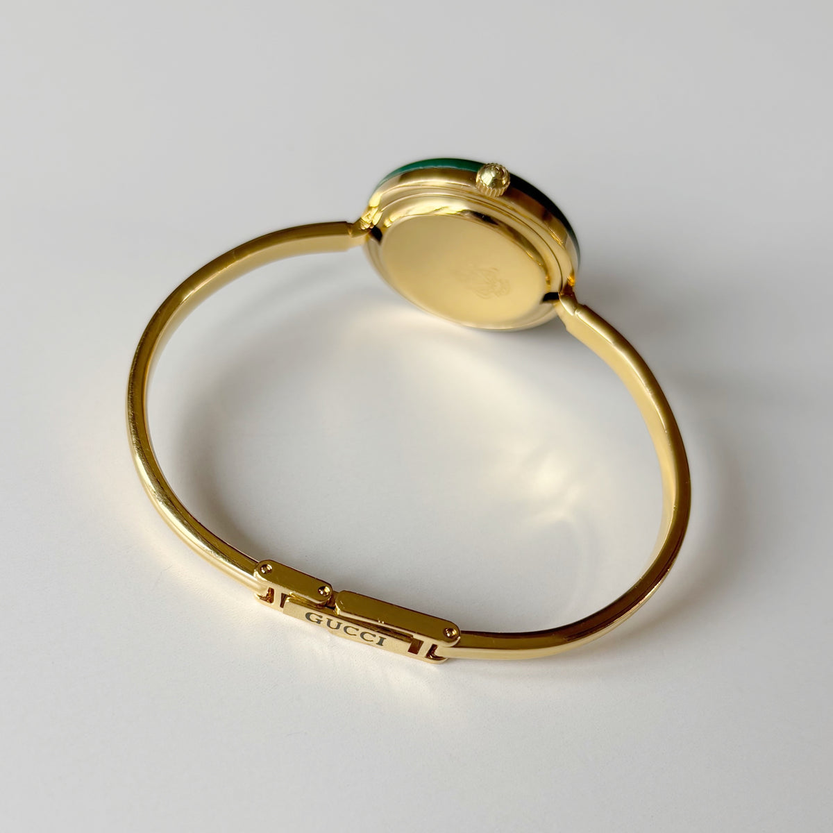 Gucci 1990s Interchangeable Bezel Gold Plated Bangle Watch with 12 bezels, case