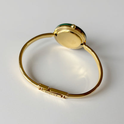 Gucci 1990s Interchangeable Bezel Gold Plated Bangle Watch with 12 bezels, case