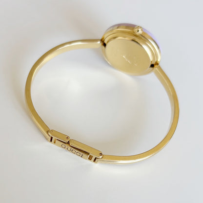 Gucci 1990s Interchangeable Bezel Gold Plated Bangle Watch with 12 bezels, case