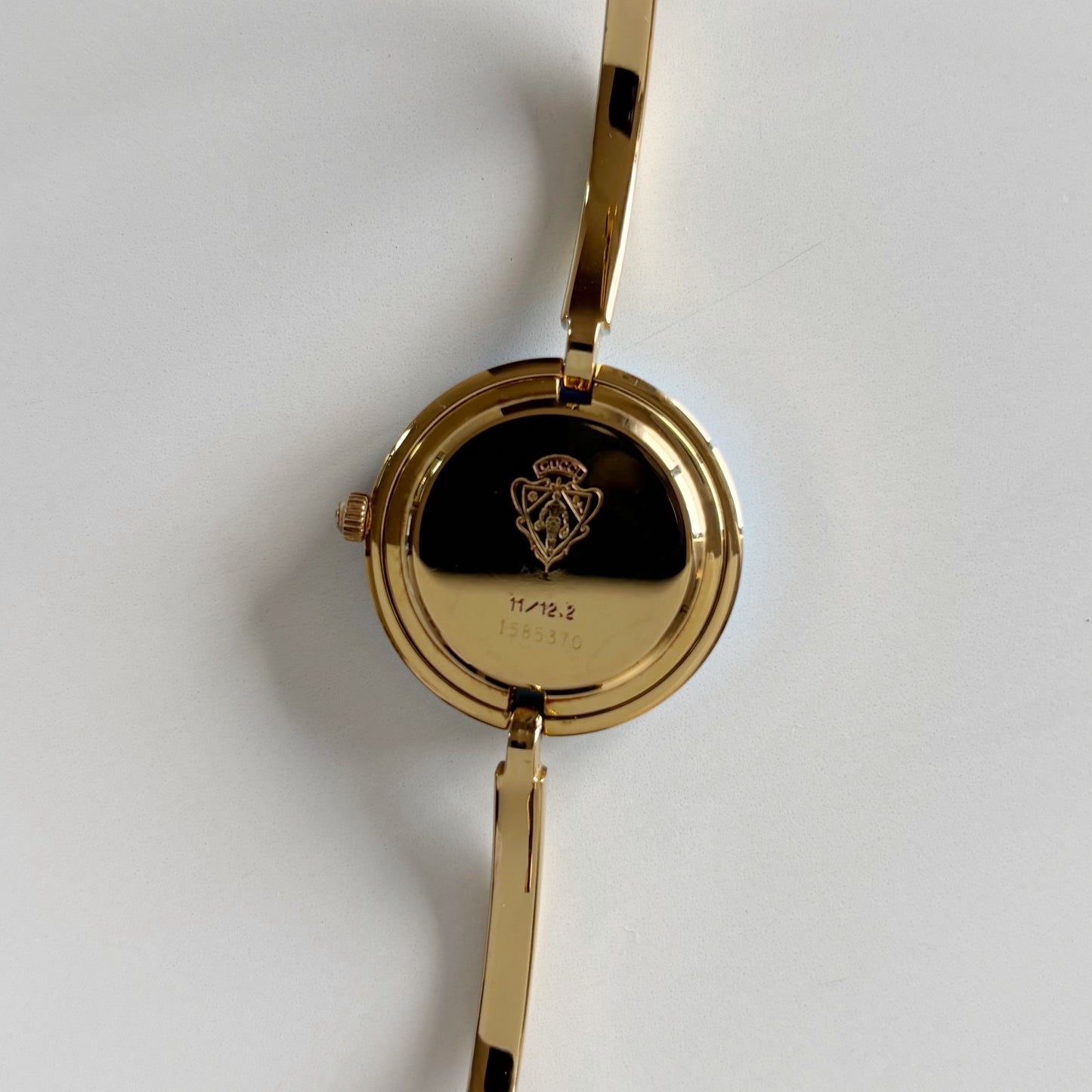 Gucci 1990s Interchangeable Bezel Gold Plated Bangle Watch with 12 bezels, case