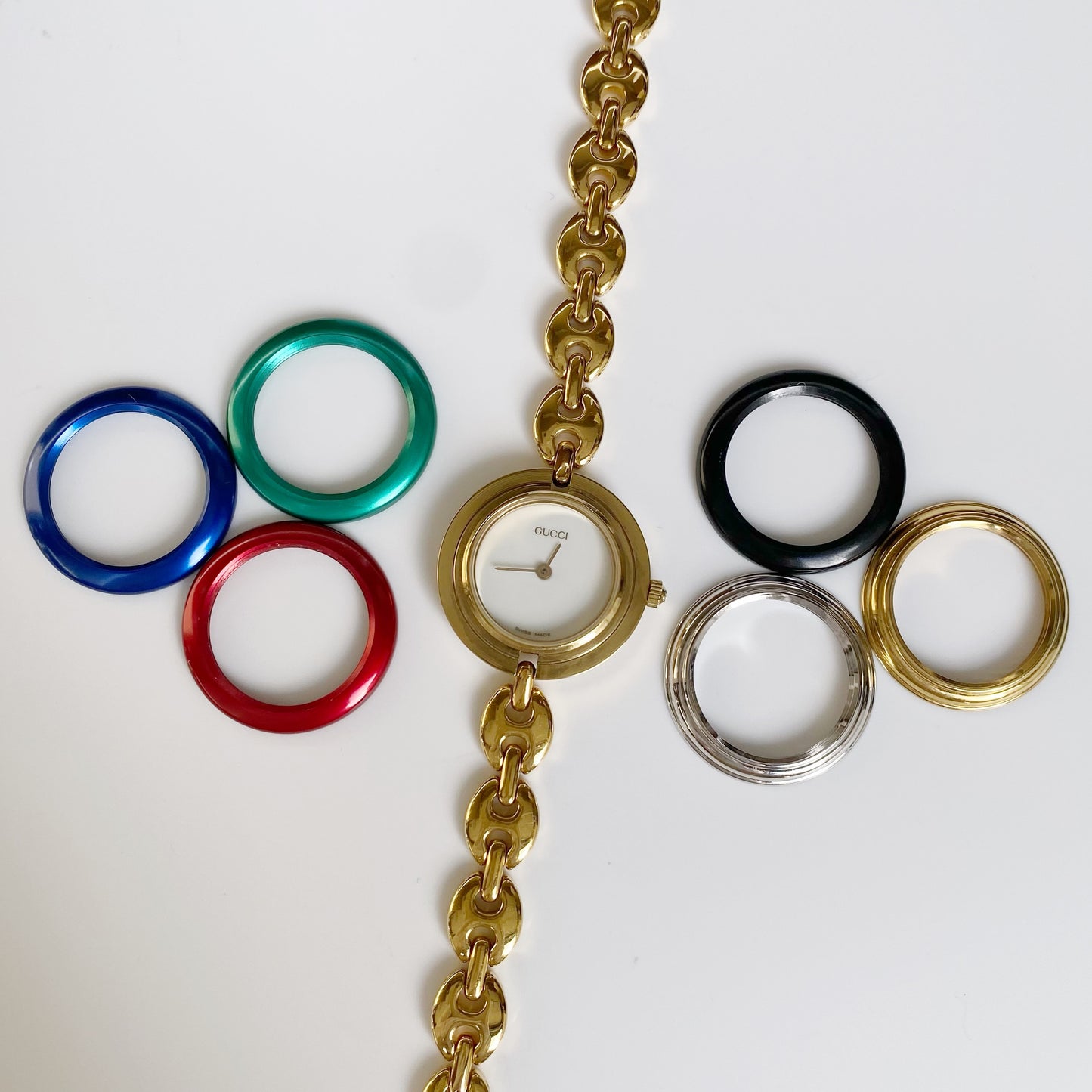 Gucci 1990s Interchangeable Bezel Gold Plated Watch with case, 6 bezels