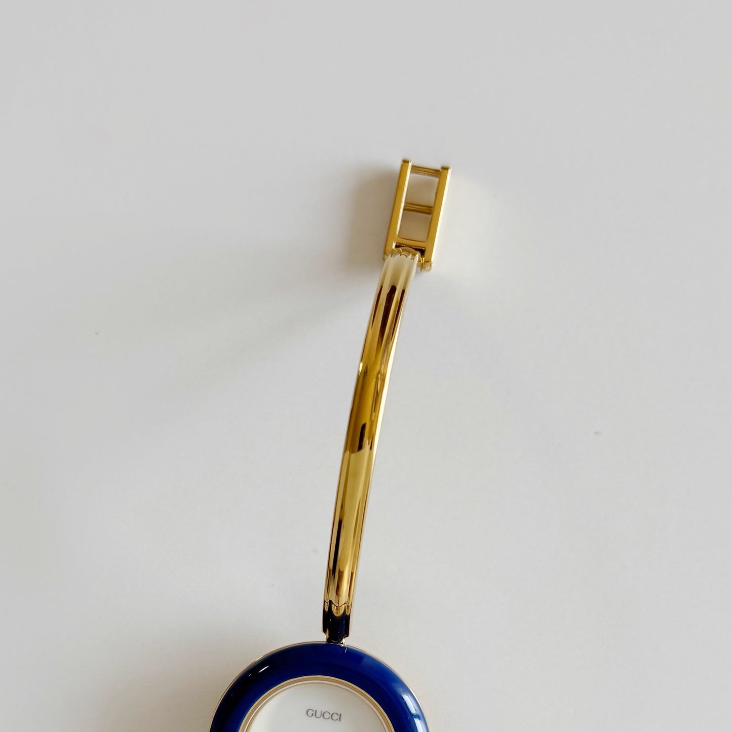 Gucci 1990s Interchangeable Bezel Gold Plated Bangle Watch with 12 bezels, case