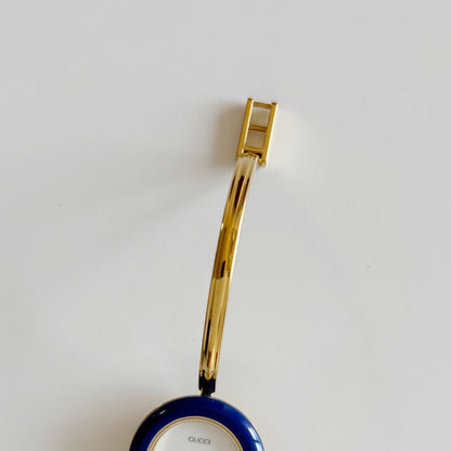 Gucci 1990s Interchangeable Bezel Gold Plated Bangle Watch with 12 bezels, case