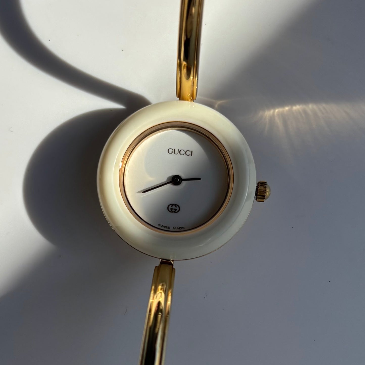 Gucci 1980s Interchangeable Bezel Gold Plated Bangle Watch with 12 bezels, case