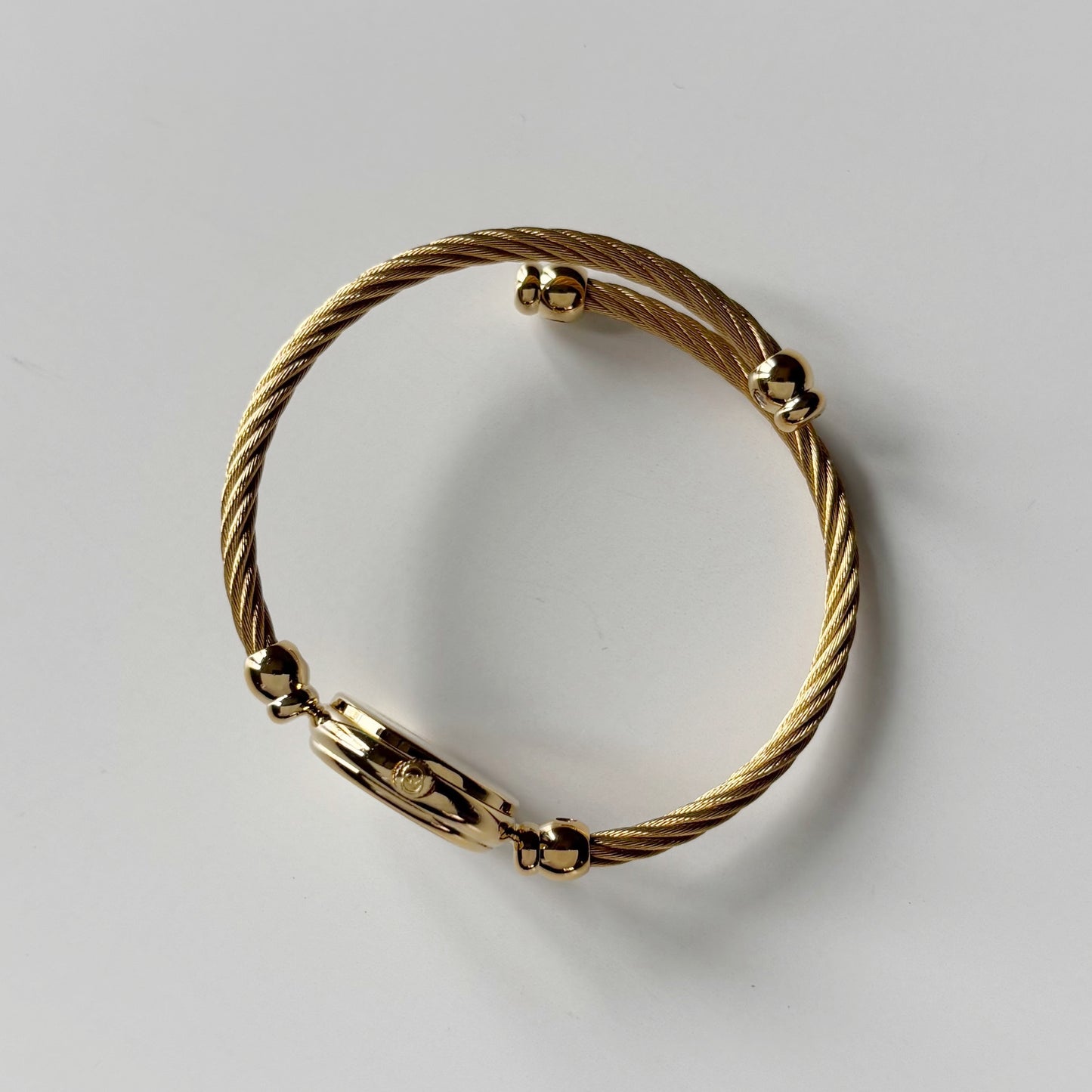 Gucci 1990s Seashell Dial Gold Plated Cable Band Bangle Watch