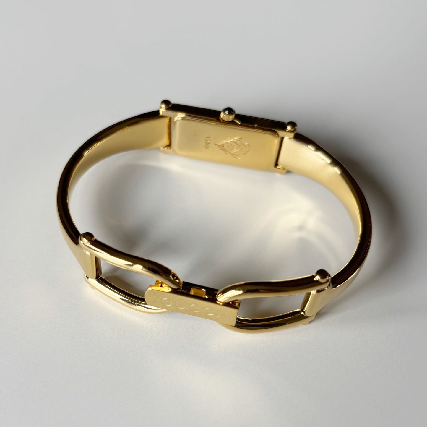 Gucci 1990s Gold Rectangular Dial Gold Plated Bangle Watch