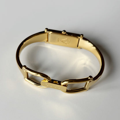 Gucci 1990s Gold Rectangular Dial Gold Plated Bangle Watch