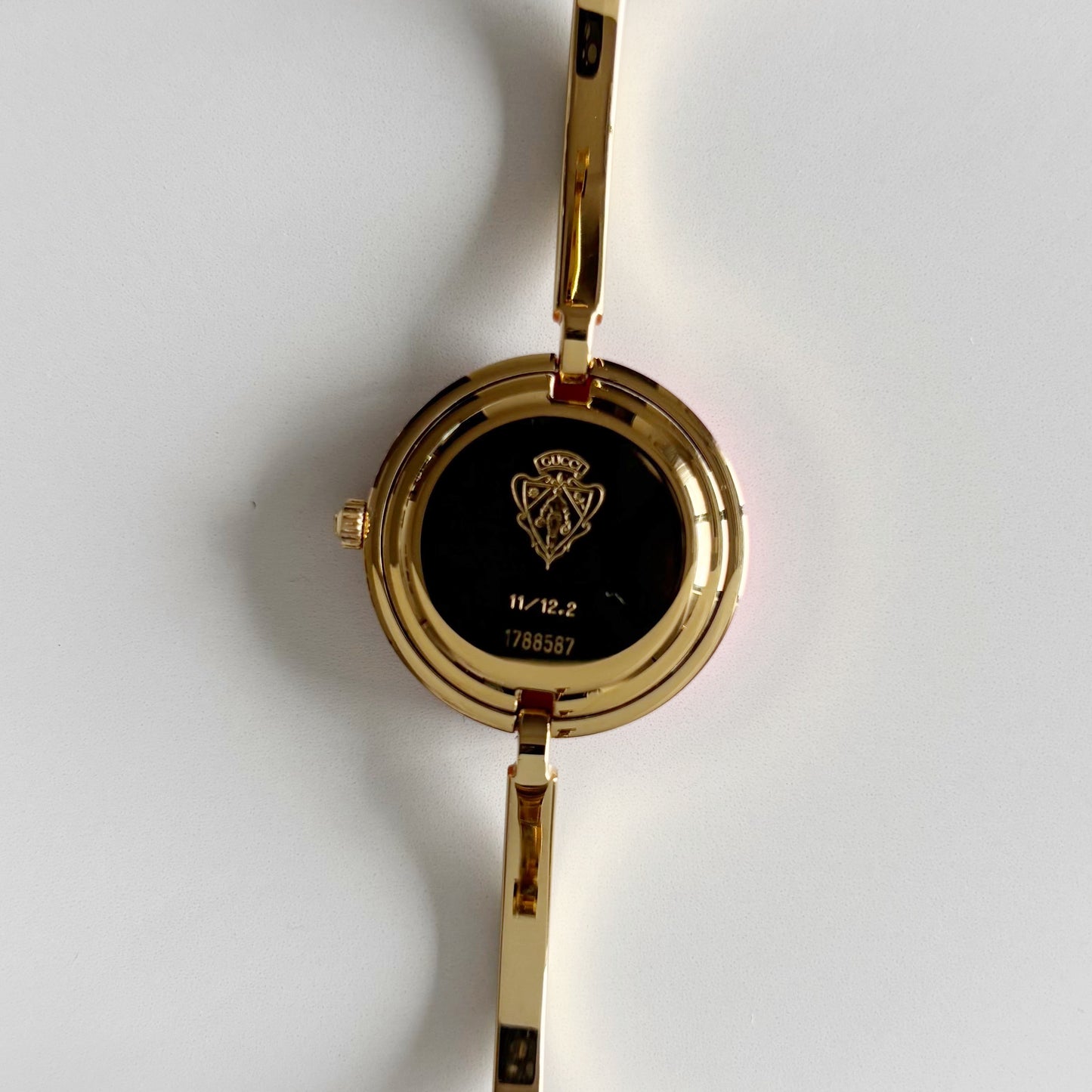 Gucci 1990s Interchangeable Bezel Gold Plated Bangle Watch with 12 bezels, case