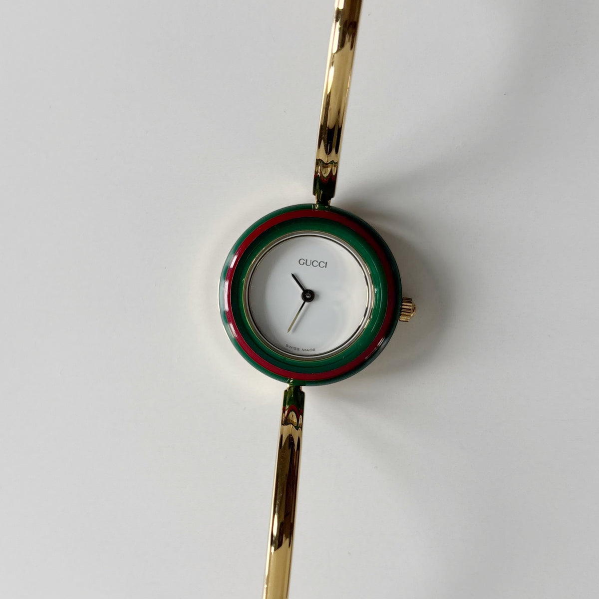 Gucci 1990s Interchangeable Bezel Gold Plated Bangle Watch with 12 bezels, case