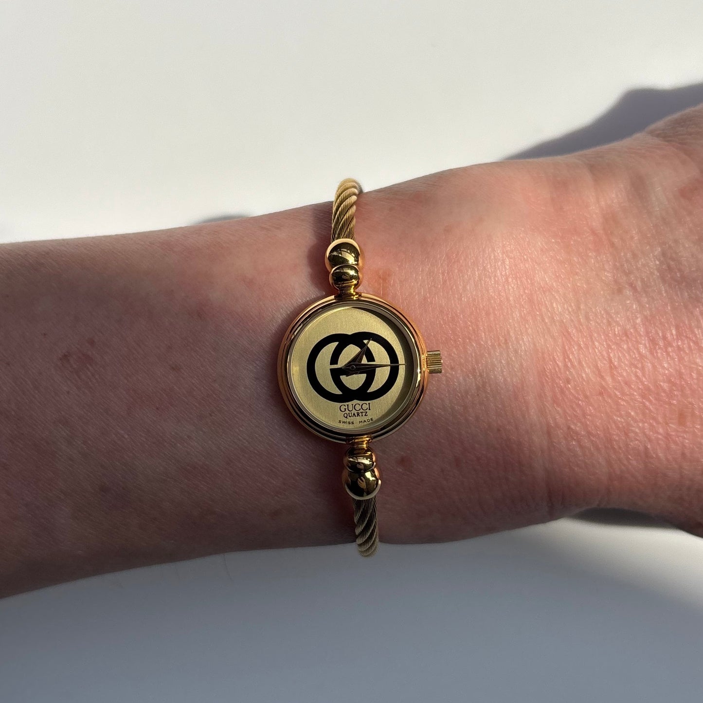 Gucci 1980s Round Dial Cable Band Bangle Watch