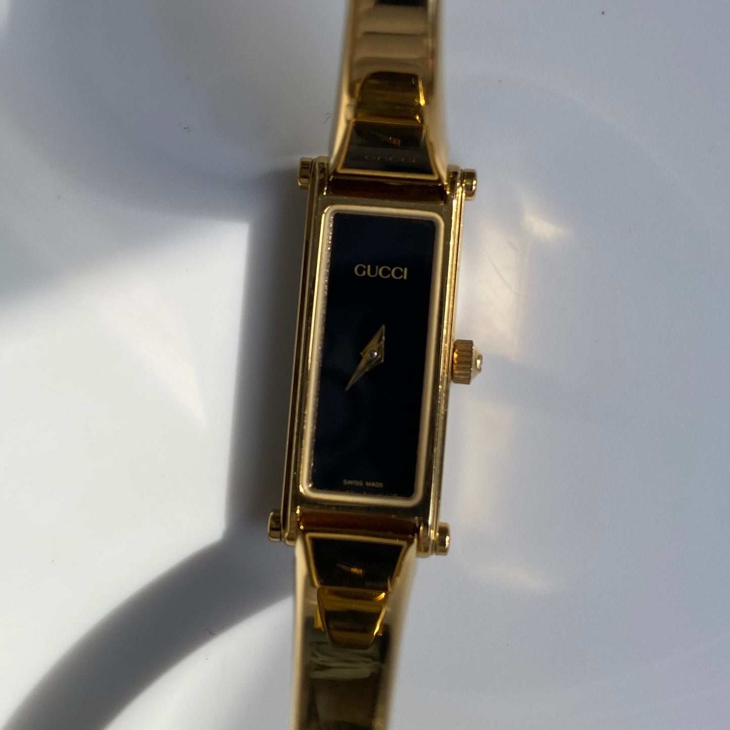 Gucci 1990s Black Dial Gold Plated Bangle Watch