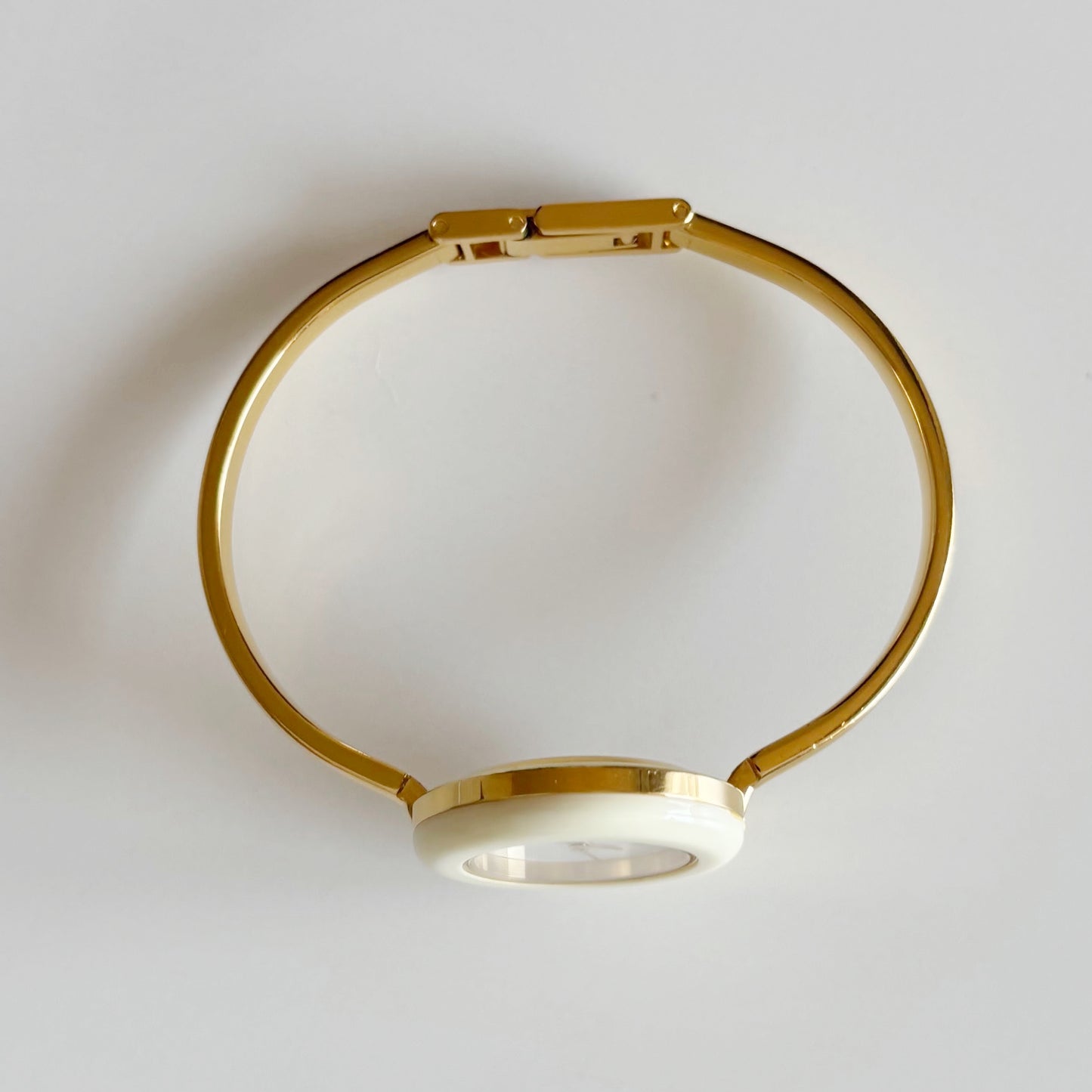 Gucci 1990s Interchangeable Bezel Gold Plated Bangle Watch with 12 bezels, case