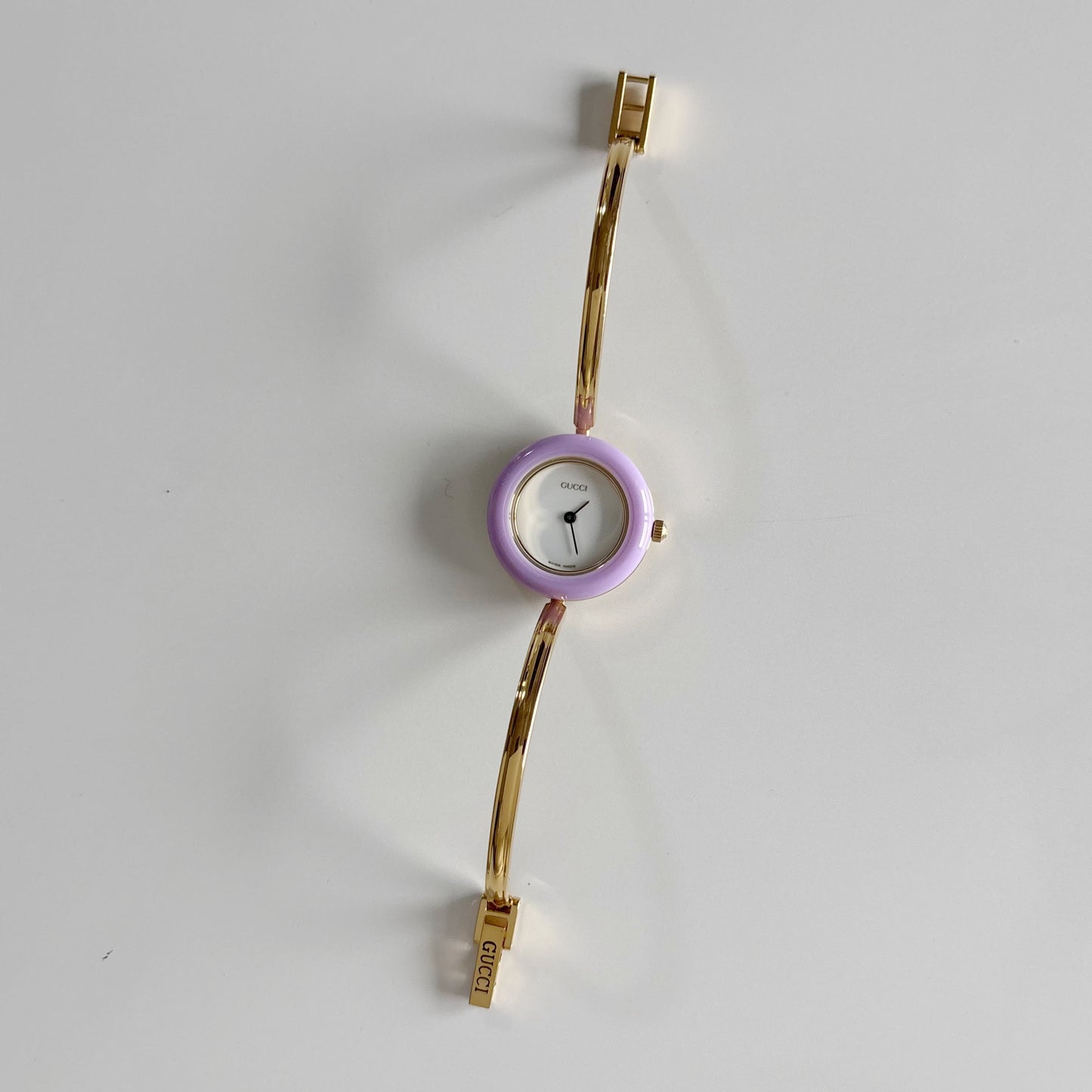 Gucci 1990s Interchangeable Bezel Gold Plated Bangle Watch with 12 bezels, case