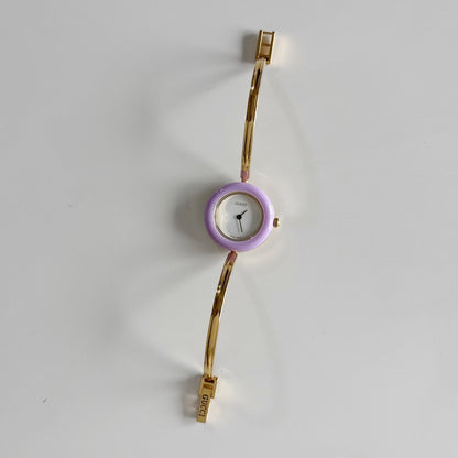 Gucci 1990s Interchangeable Bezel Gold Plated Bangle Watch with 12 bezels, case
