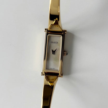 Gucci 1990s Seashell Rectangular Dial Gold Plated Bangle Watch